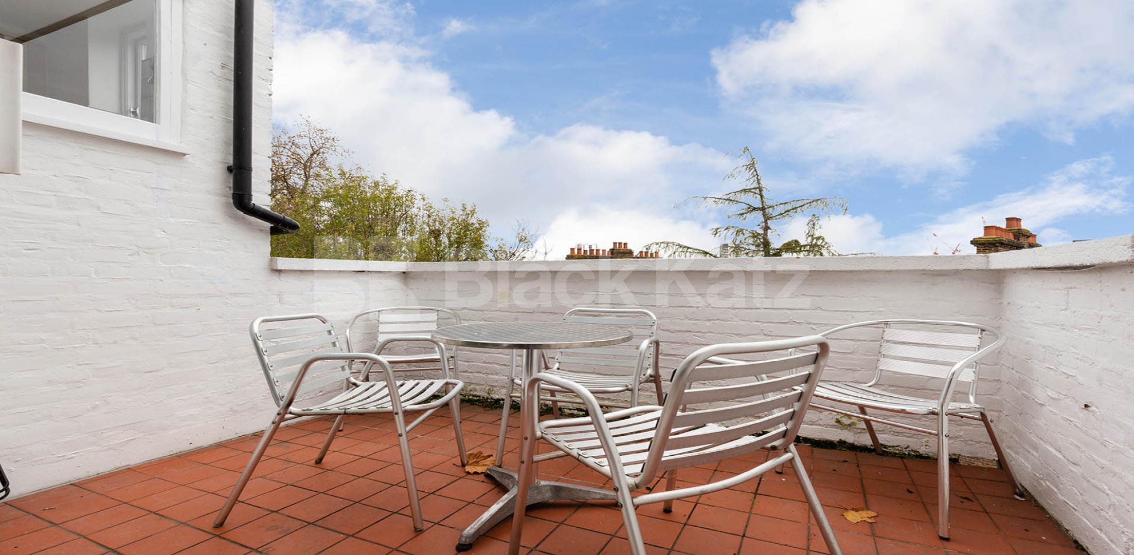 Stunning modern split level 3 bed with a private roof terrace in camden square Stratford Villas, Camden Square